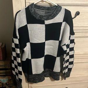 Black and white checkerboard sweater never worn